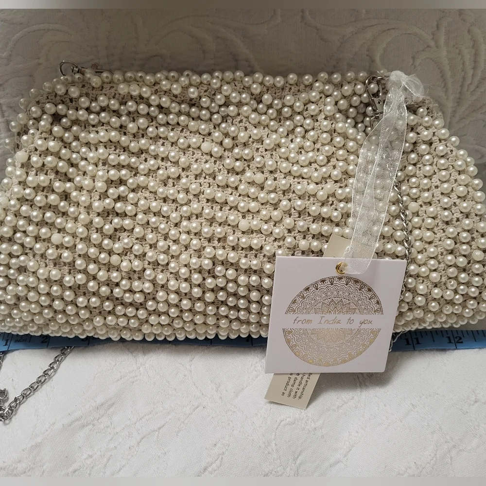Elegant Cream Beaded Clutch with Curved Frame - Picture 3 of 15